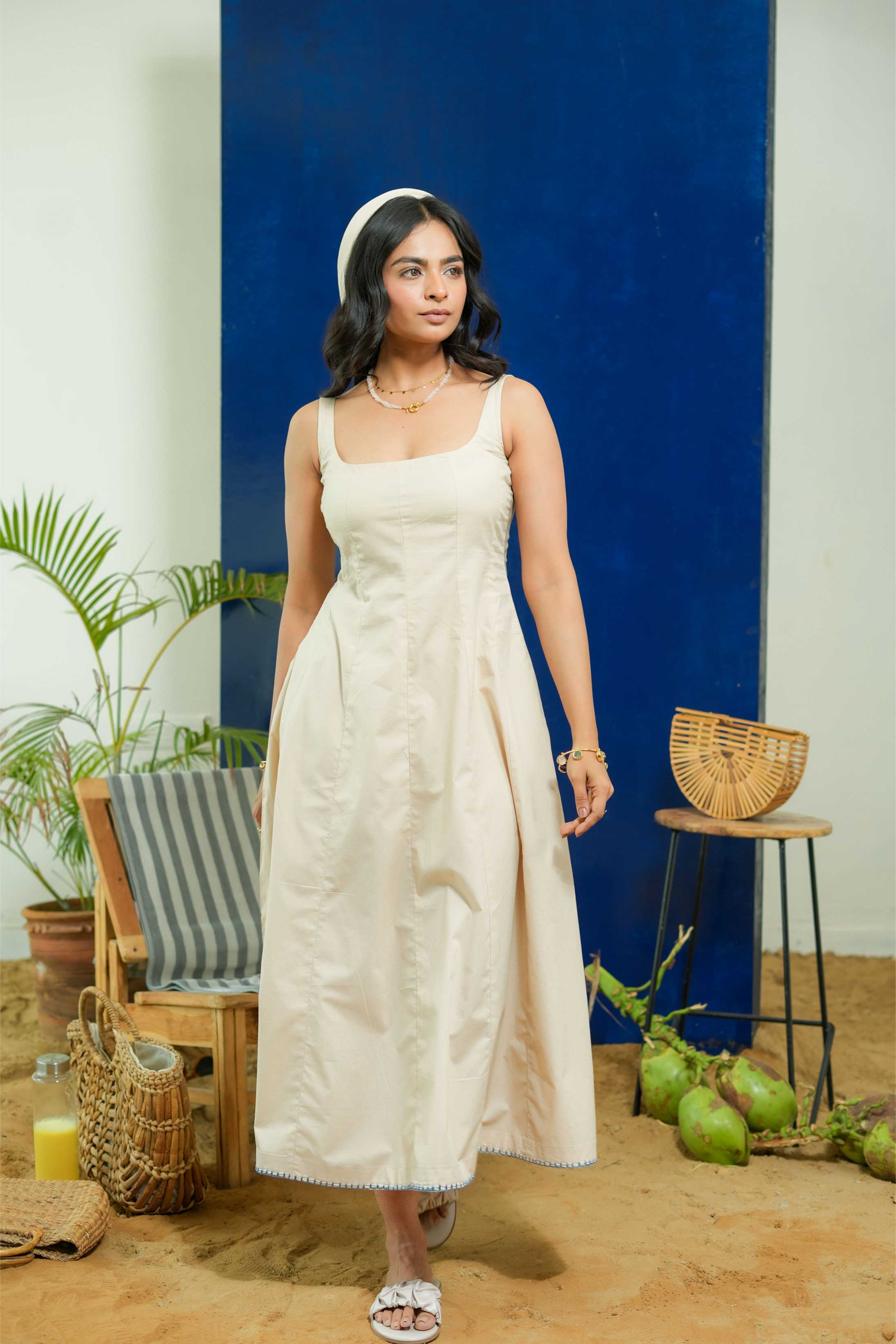 BEIGE SLEEVELESS FITTED DRESS