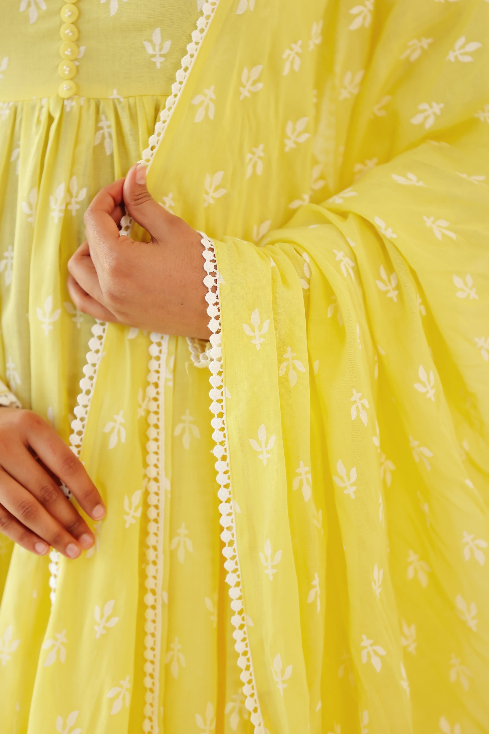 VARNIKA YELLOW MULMUL ANARKALI SET (RTS)